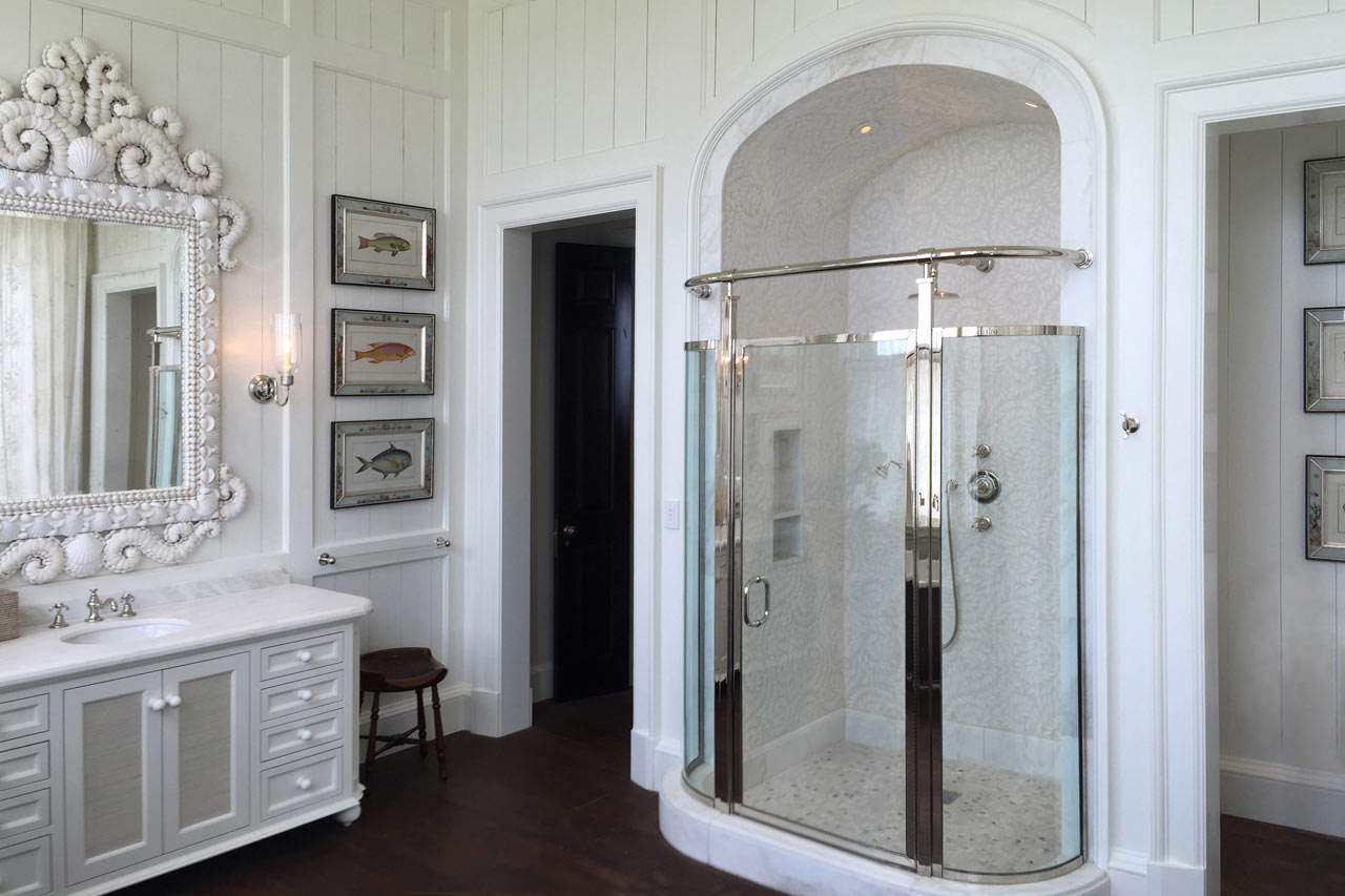 Master Bathroom of a Neoclassical beach house designed by Maria de la Guardia & Teofilo Victoria of DLGV Architects & Urbanists built of coral stone in collaboration with Ernesto Buch