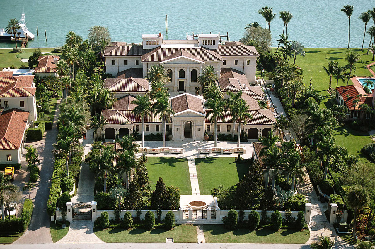 aerial view of a Traditional neoclassical estate accentuated with coral stone, designed by Maria de la Guardia & Teofilo Victoria of DLGV Architects & Urbanists in collaboration with Ernesto Buch